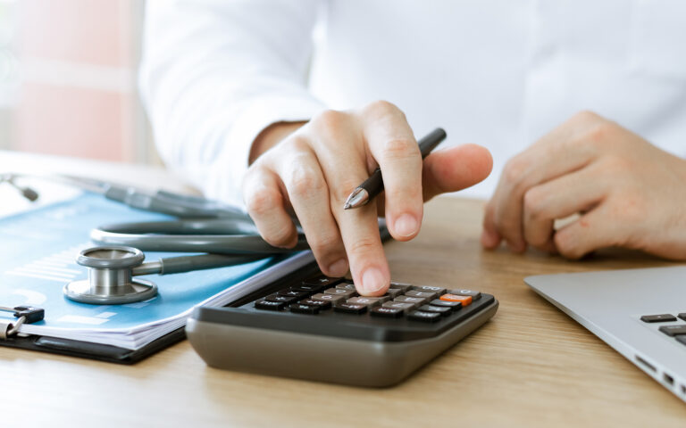 Front view of a doctor on calculator-1